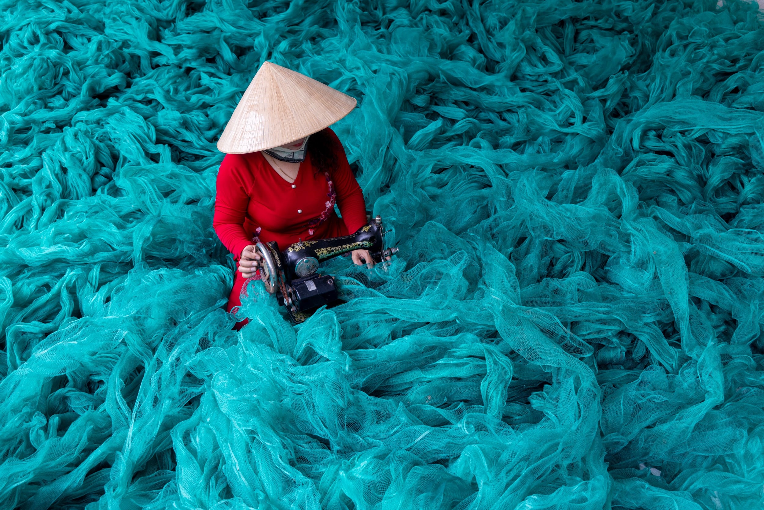 Nets, mended by hand